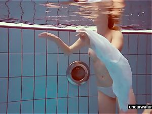 ultra-cute red-haired plays nude underwater